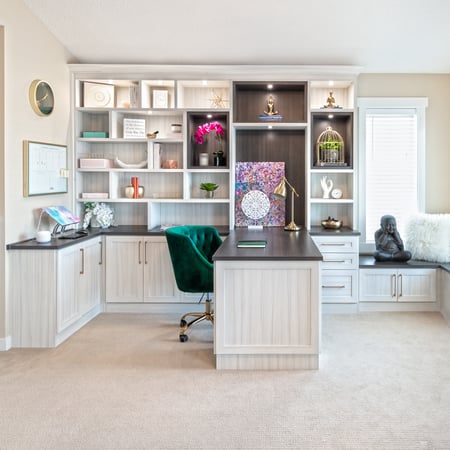 Retreat Home Office-Design of the Year 2020.

Home Office with a light wood grain finish and accented countertop, display boxes peninsula desk, closed cabinetry, open shelving, lighting, and a bench.