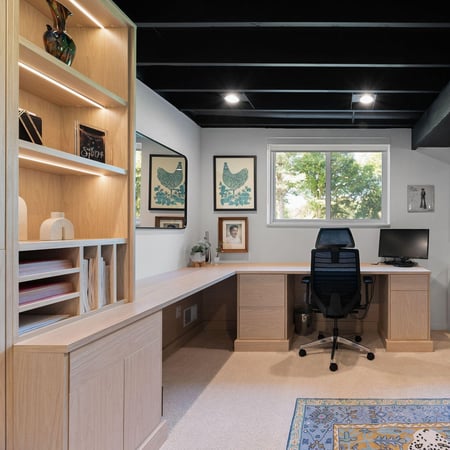 home office with a corner desk, drawers, and shelving by California Closets Northern Michigan