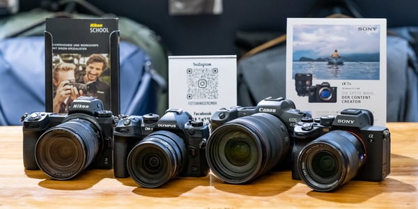 diverse Kameras & Objektive (Nikon, Fujifilm, Canon, Olympus, Sony etc.)
