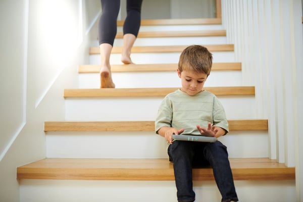 Kid using the internet after moving in.