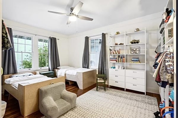 Bookcases and bookshelves with drawer stack for a kid's custom closet design California Closets New Orleans & Gulf Coast