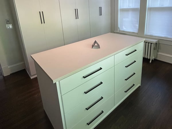 Greensboro - Custom closets - walk-in closet with floor-to-ceiling cabinet doors and a center island for extra storage
