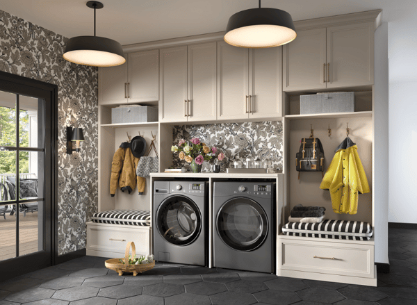 Light finish mudroom/laundry area with cubbies, benches, and storage by California Closets Norwalk, Connecticut.