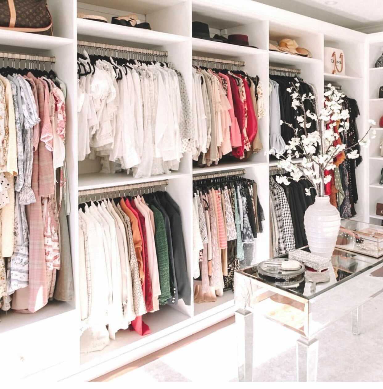 White walk-in closet with hanging space