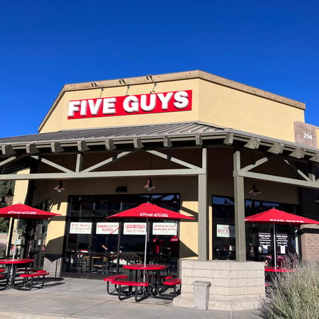 Exterior image of the entrance to the Five Guys restaurant at 254 Lee Boulevard in Prescott, Arizona.