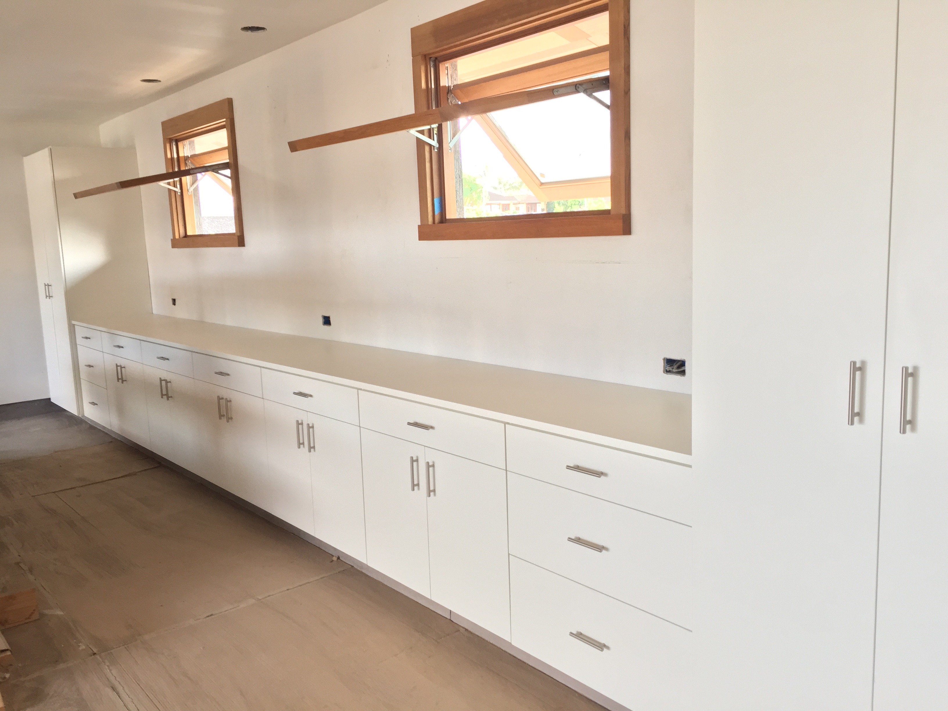 Custom garage storage by California Closets Hawaii.