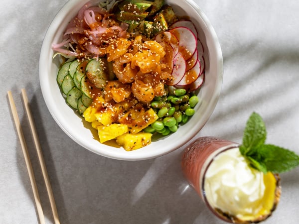 BBQ shrimp bowl and tropical Paradise Punch cocktail