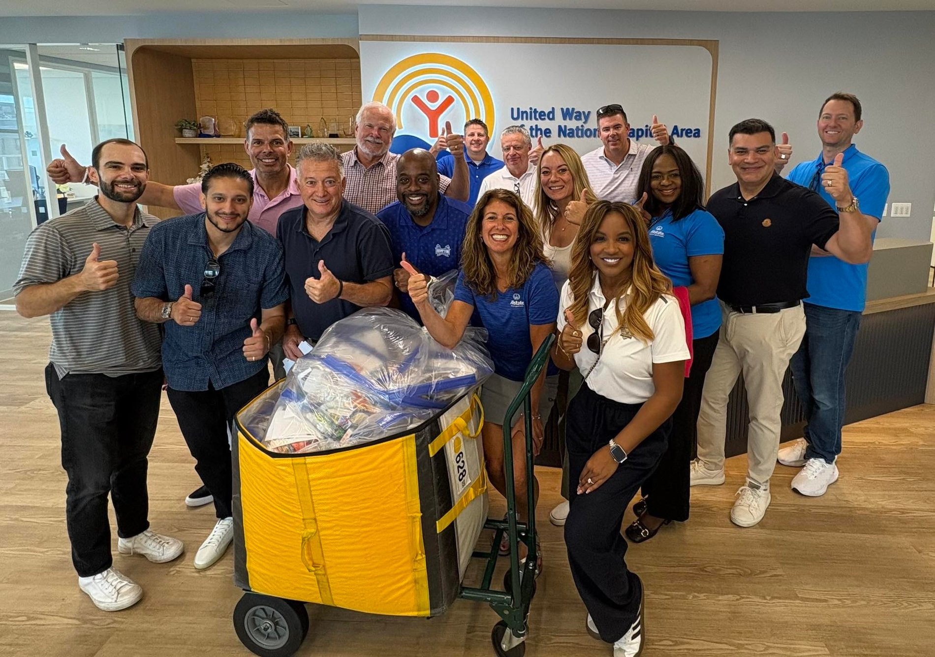 Gainesville, VA Allstate Agent Christine Angles volunteering at United Way of the National Capital Area.  Learned about ALICE (Asset Limited, Income Constrained, Employed) families and packed snacks for nearby school kids.