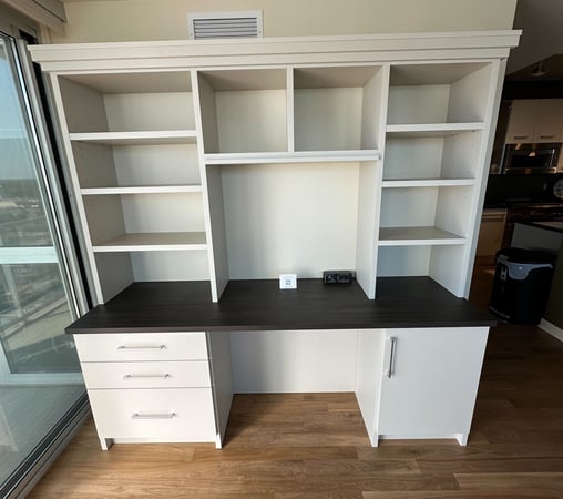 White Built in desk with a dark brown countertop. With shelving and Drawers