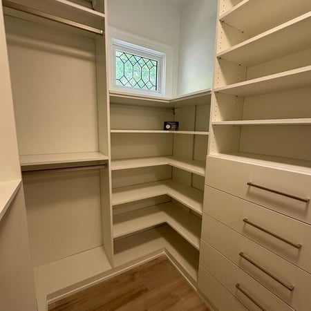 Greensboro - Custom closets - walk-in closet with wrap-around corner shelves and drawers