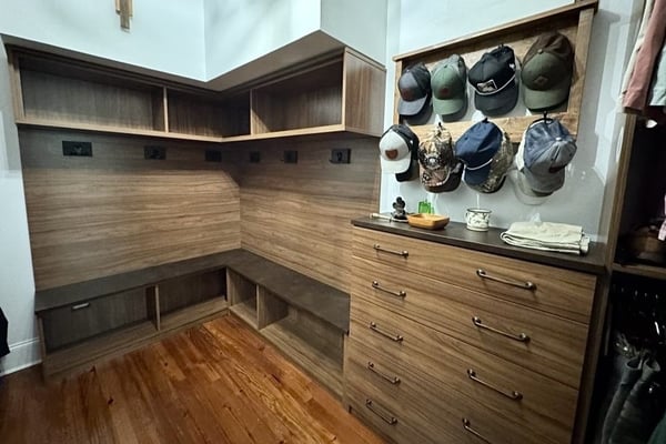 Brown custom closets organization with a hat rack and drawers California Closets Baldwin County and Mobile