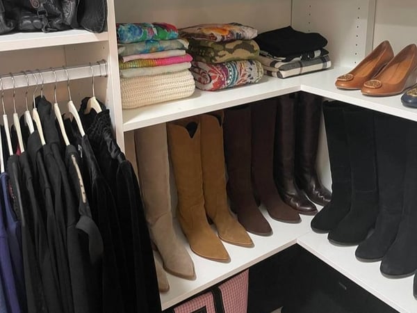 Greensboro - Custom closets - wrap-around corner shelving with organized shoes and clothing