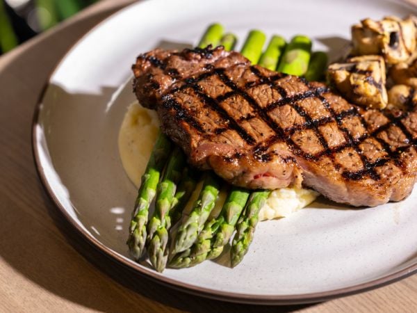 steak with mashed potato, asparagus and mushrooms