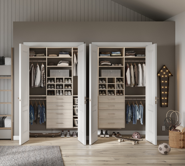 Light wood finish reach-in kids closet with double hanging space, shoe shelves and drawers by California Closets Greenwich, Connecticut.