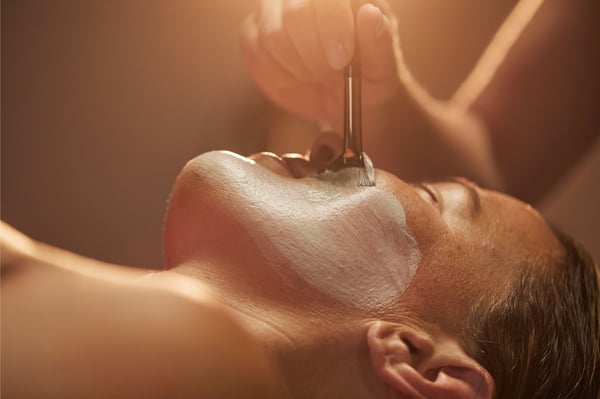 woman recieving facial