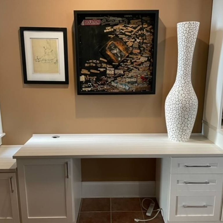 Richmond - Custom closets - Desk with cabinets and drawers connected to a shelving unit