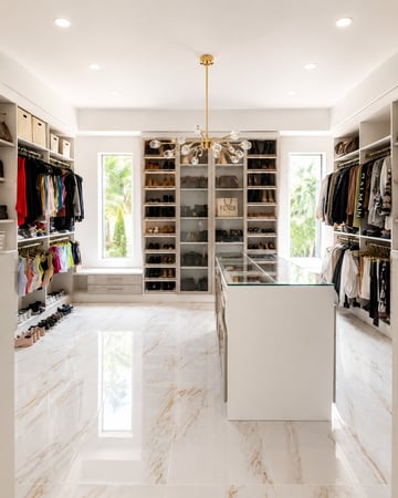 Primary Walk-in Closet with room for all your hanging clothes, shoes and accessories.
