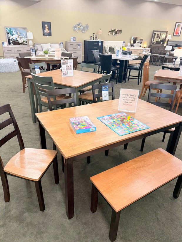 Looking for a family-friendly dining table set in Burlington, Iowa? At Slumberland Furniture Burlington, we specialize in affordable dining room furniture that blends durability, style, and function—perfect for everyday meals or game nights with the kids. This compact rectangular dining table with bench and chairs is a top choice for small spaces, apartments, and growing families who want value without sacrificing style. Crafted with a warm wood top and espresso-finished legs, it pairs beautifully with both modern and rustic décor. Whether you're searching for a kitchen table with bench seating, small dining sets, or game-night ready furniture, our Burlington showroom has it all. We carry hardwood dining sets, budget-friendly table-and-chair sets, and 60% off clearance furniture from top brands. Plus, we offer 0% interest financing, no promo fees, and delivery options across Southeast Iowa, including Fort Madison, Mount Pleasant, and Mediapolis. Explore our wide selection of dining furniture in stock now and see how easy it is to furnish your home for less—with design help and deals you won’t find anywhere else.