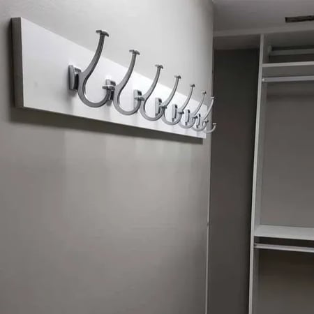 Turn your cluttered reach-in closet into a space with all of your necessities at reach.