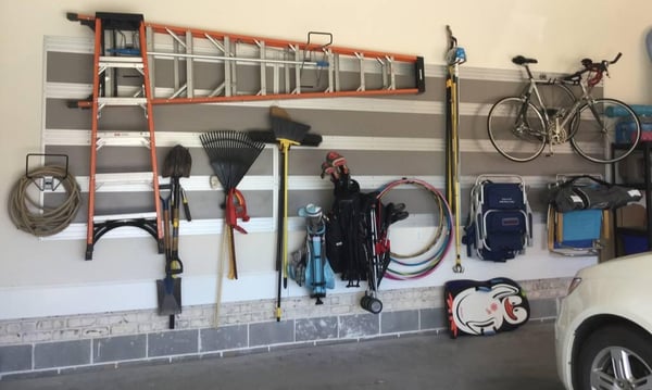 Greensboro - Custom closets - Garage storage unit mounted to the wall for organizing household items