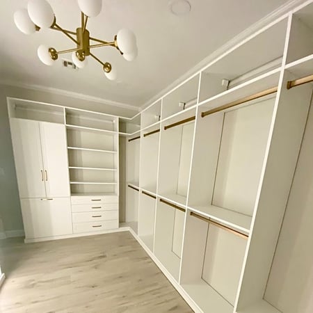 Custom closets organization with wardrobe in closet California Closets New Orleans & Gulf Coast