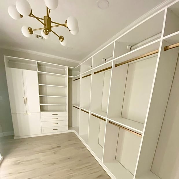 Custom closets organization with wardrobe in closet California Closets New Orleans & Gulf Coast