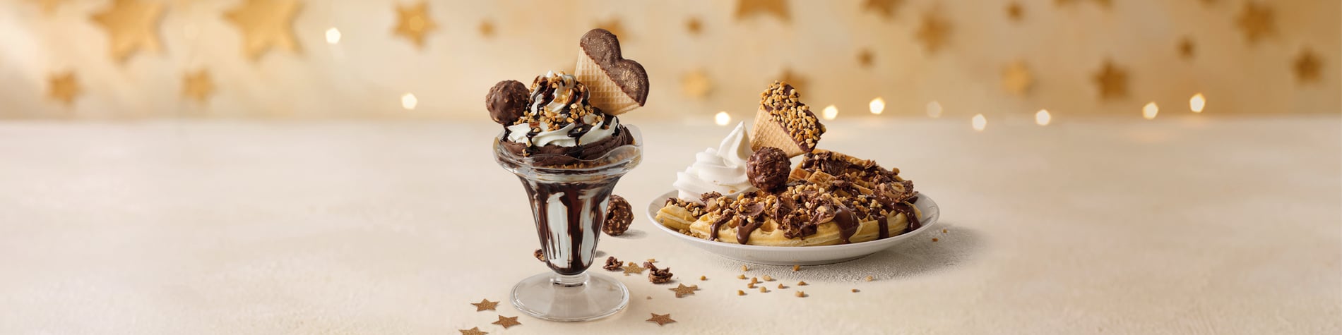 The NEW Ferrero Rocher® Sunnydae & the Ferrero Rocher® Waffle on a beige surface with confetti and golden stars.
