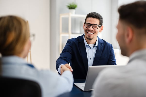 Bank of Texas employee working with customers.