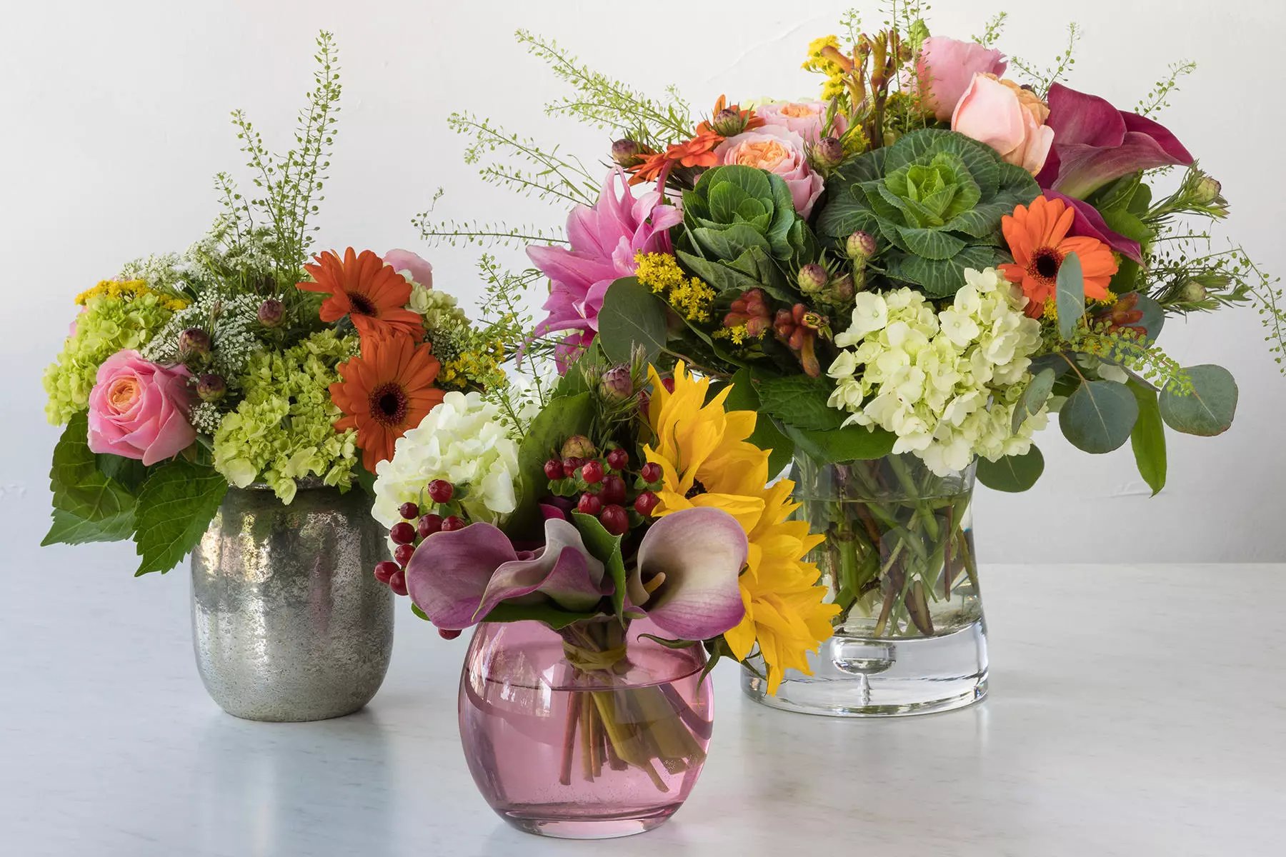 3 bouquets of fresh cut flowers