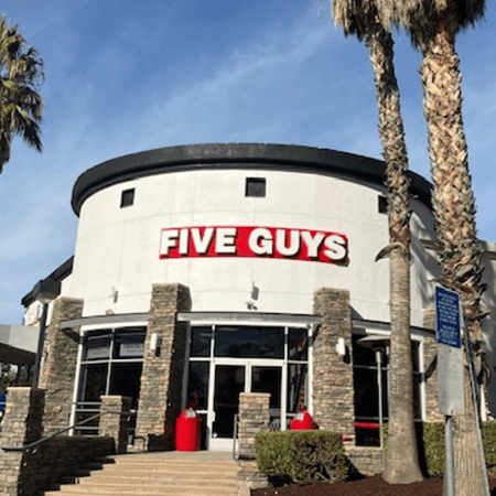 Exterior photograph of the Five Guys Restaurant at 929 N. Milliken Avenue in Ontario, California.