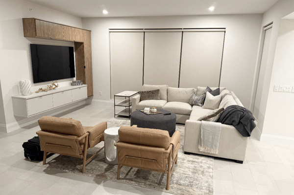 Virtuoso media center featuring modern design and integrated storage and display elements.