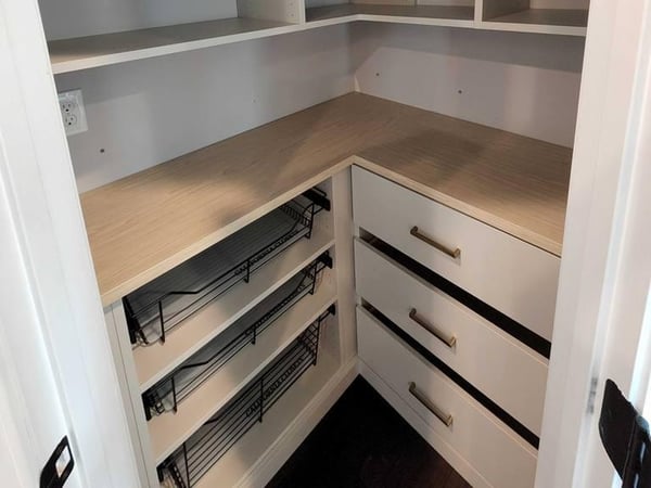 Greensboro - Custom closets - corner pantry filled with custom shelves, racks, drawers, and counters