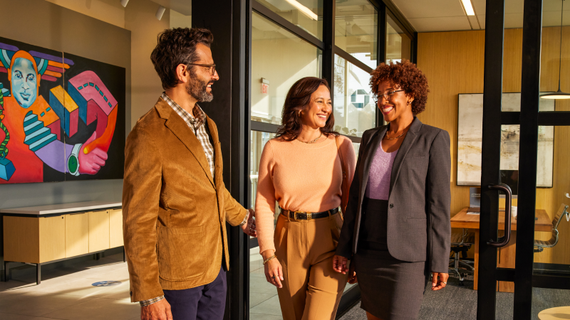 Group of advisors smiling