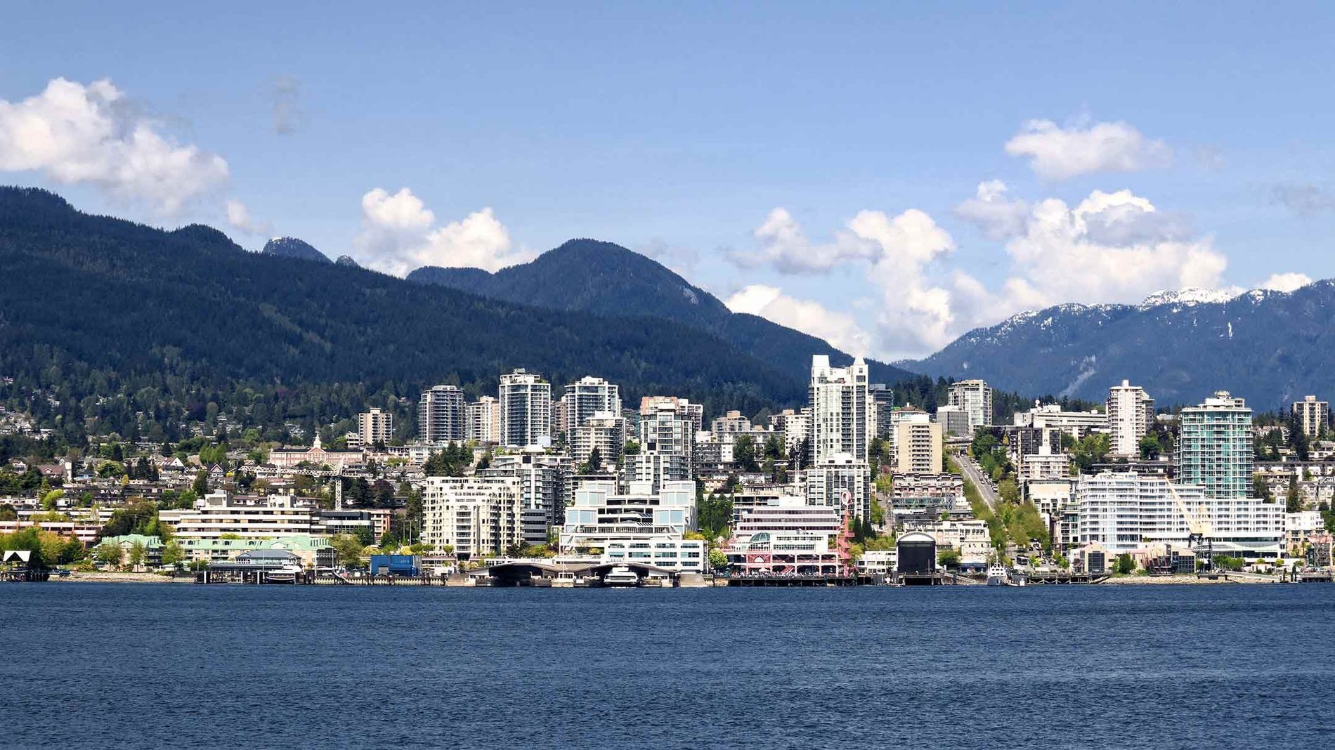 North Vancouver shore and skyline on Lonsdale Quay with highrise residential and commercial buildings