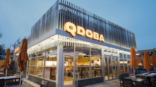 A Qdoba store front with an ourdoor dining patio.