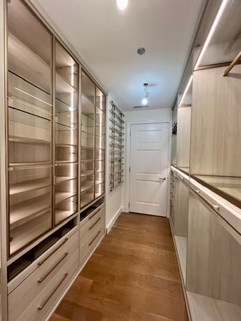 Closet with glass inserts California Closets Chicago