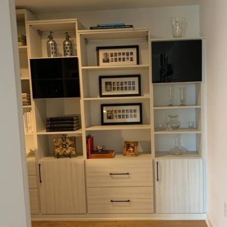 A living room shelving unit designed for display and functionality.