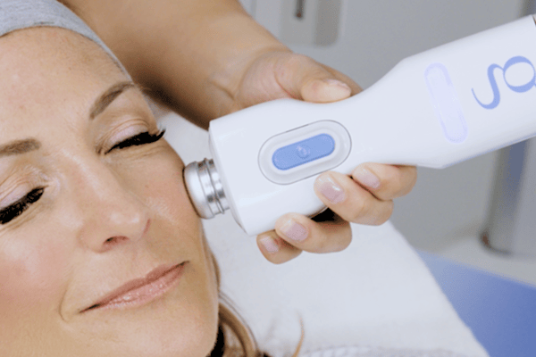 Woman receiving Glacial Skin Cryo Facial Treatment