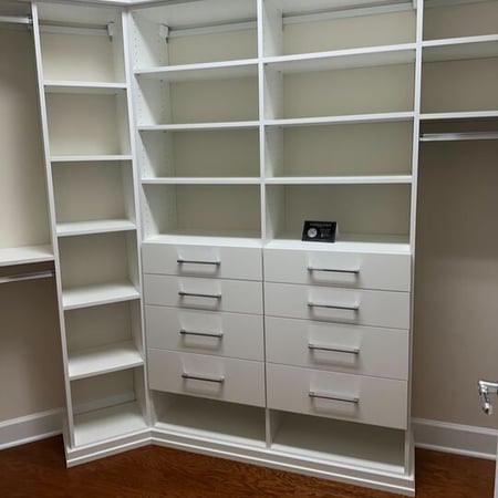 Virginia Beach – Custom closet – White walk-in closet with drawers, shelving, and hanging space