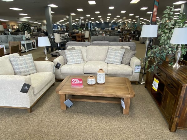 Eveleth Slumberland Furniture sofa and coffee table