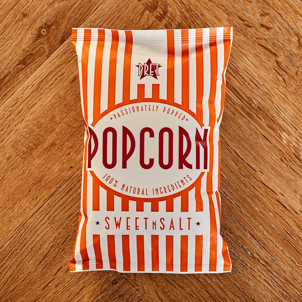 Pret packet of popcorn on a table