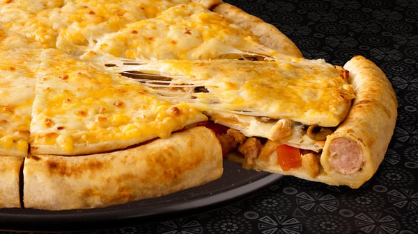 Chicken Cram-Decker® pizza from Debonairs Pizza with 3 layers and a crust crammed with 2 chicken cheese-grillers