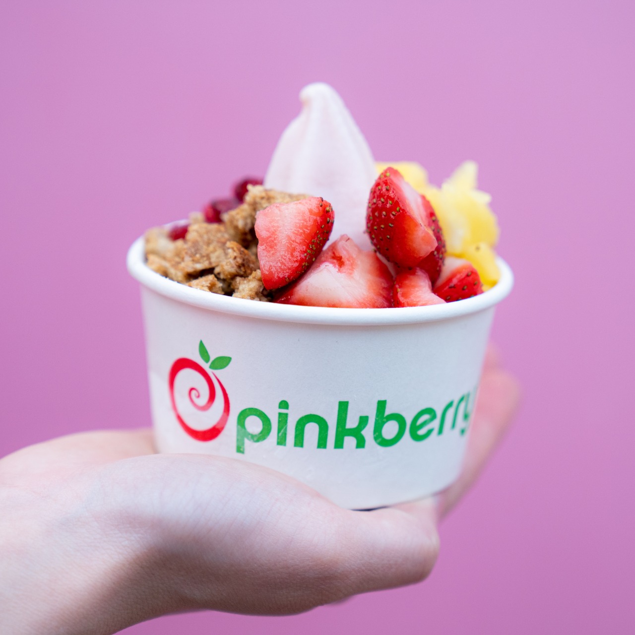 pinkberry pomegranate cup with toppings