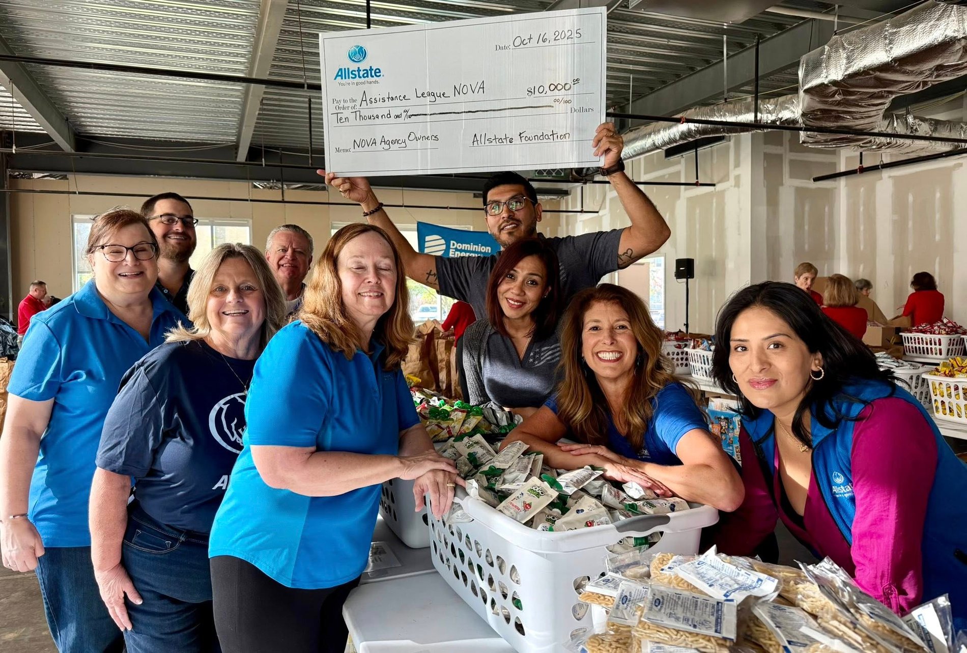 Christine Angles, Northern Virginia insurance agent, volunteering with the Assistance League of Northern Virginia to pack weekend food bags for local kids – the Allstate Foundation is giving the organization a $10,000 grant to keep this important work going.