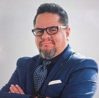 A headshot image of Carlos Moctezuma.