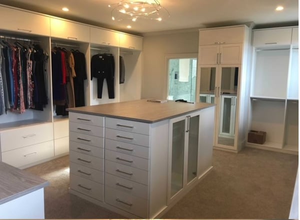 Luxury walk-in closet by California Closets Richmond, Virginia.