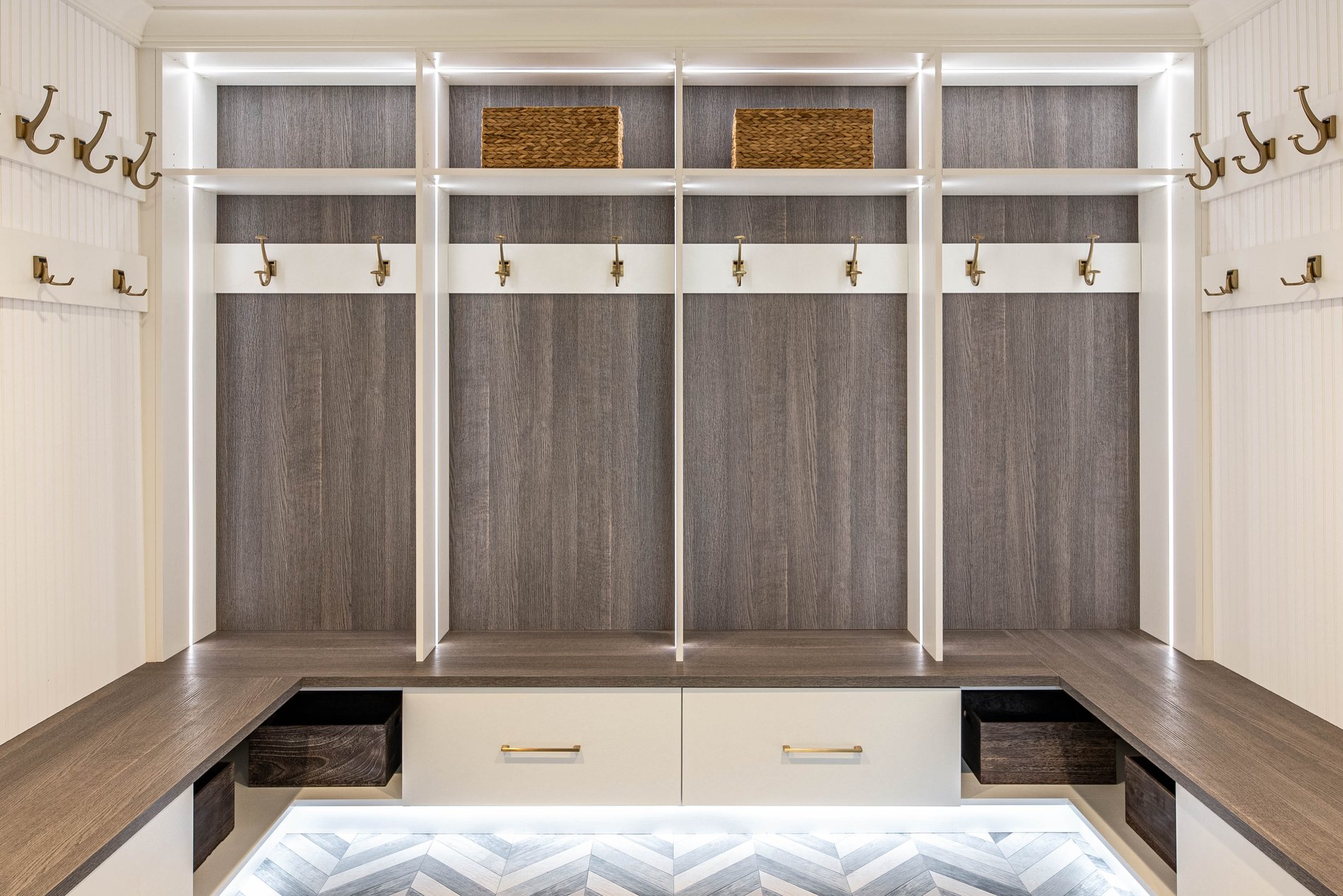 Custom Mudroom with Bench, hooks and lighting by California Closets Greater Detroit, Michigan.