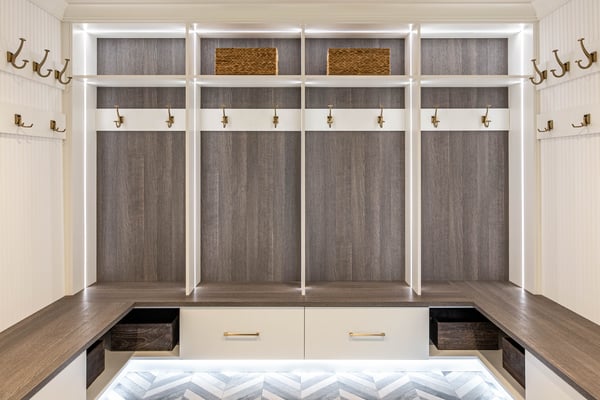 Custom Mudroom with Bench, hooks and lighting by California Closets Greater Detroit, Michigan.