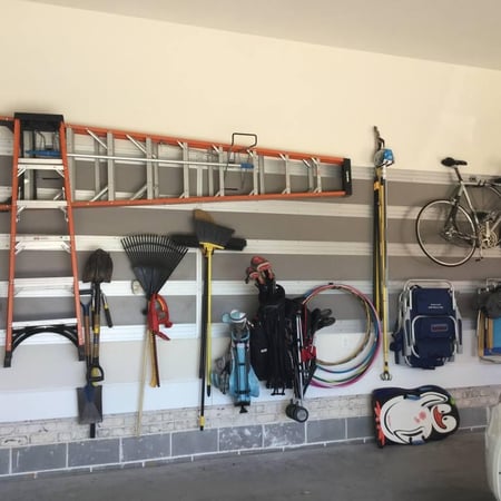 Greensboro - Custom closets - Garage storage unit mounted to the wall for organizing household items