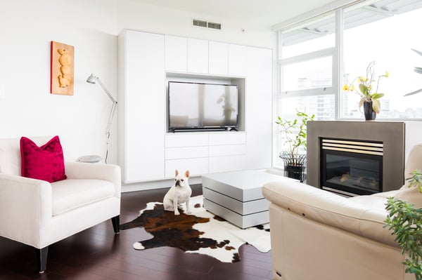 Full view of a sleek and modern media unit with all electronics hidden behind smooth doors